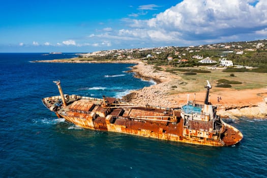 Abandoned Edro III Shipwreck at seashore of Peyia, near Paphos, Cyprus. Historic Edro III Shipwreck site on the shore of the water in Cyprus. Aerial view of Shipwreck EDRO III, Pegeia, Paphos.