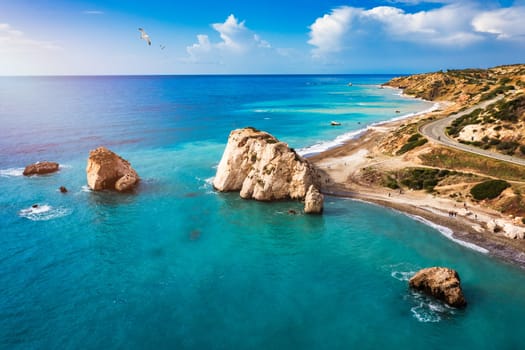 Petra tou Romiou (Aphrodite's Rock) the birthplace of Aphrodite, Paphos, Cyprus. Aerial view of Petra tou Romiou, aka Aphrodite's rock a famous tourist travel destination landmark in Paphos, Cyprus.