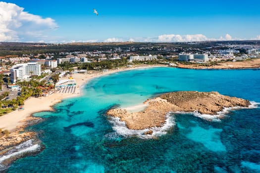 Aerial view of beautiful Nissi beach in Ayia Napa, Cyprus. Nissi beach in Ayia Napa famous tourist beach in Cyprus. A view of a azzure water and Nissi beach in Aiya Napa, Cyprus.