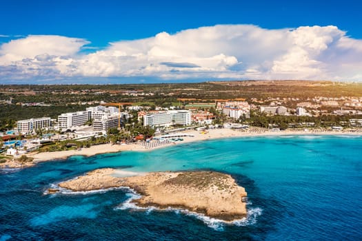 Aerial view of beautiful Nissi beach in Ayia Napa, Cyprus. Nissi beach in Ayia Napa famous tourist beach in Cyprus. A view of a azzure water and Nissi beach in Aiya Napa, Cyprus.