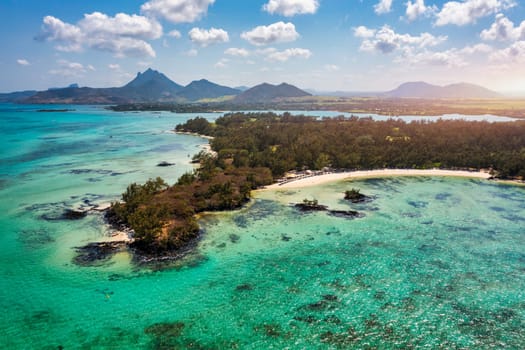 Ile aux Cerfs island with idyllic beach scene, aquamarine sea and soft sand, Ile aux Cerfs, Mauritius, Indian Ocean, Africa. Ile aux Cerf in Mauritius, beautiful water and breathtaking landscape.