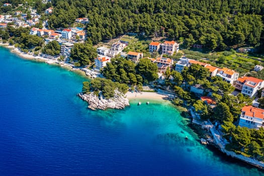 Amazing aerial view of the beautiful Podrace beach in Brela, Makarska Riviera, Croatia. Aerial view of Podrace beach and waterfront on Makarska riviera, Brela, Dalmatia region of Croatia.