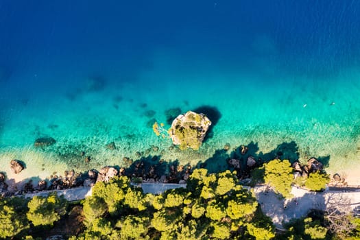 Kamen Brela symbol of the city of Brela on Adriatic coast of Dalmatia, Croatia. Kamen Brela, tiny famous island in Brela, Makarska Riviera, Dalmatia, Croatia.