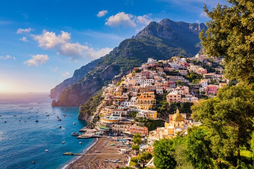 View of Positano with comfortable beach and blue sea on Amalfi Coast in Campania, Italy. Positano village on the Amalfi Coast, Salerno, Campania. Beautiful Positano, Amalfi Coast in Campania.