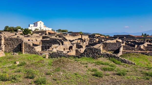 Ancient ruins of Pompei city (Scavi di Pompei), Naples, Italy. View of ancient city of Pompeii, Pompei is ancient Roman city died from eruption of Mount Vesuvius in 1st century, Naples, Italy.