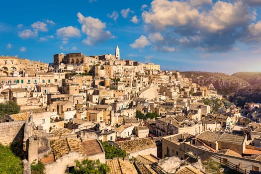 Panoramic view of the ancient town of Matera (Sassi di Matera) in a beautiful autumn day, Basilicata, southern Italy. Stunning view of the village of Matera. Matera is a city on a rocky outcrop.