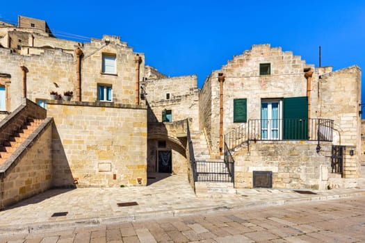 Panoramic view of the ancient town of Matera (Sassi di Matera) in a beautiful autumn day, Basilicata, southern Italy. Stunning view of the village of Matera. Matera is a city on a rocky outcrop.
