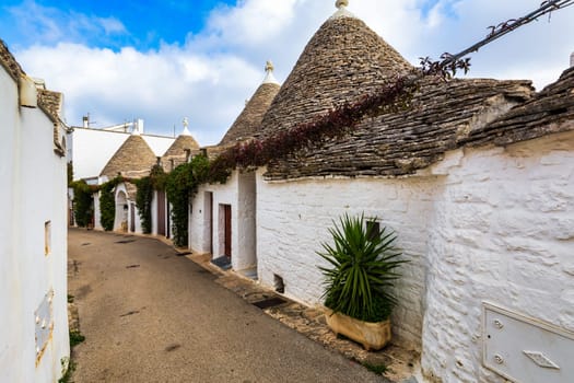 The traditional Trulli houses in Alberobello city, Apulia, Italy. Cityscape over the traditional roofs of the Trulli, original and old houses of this region, Apulia, Alberobello, Puglia, Italy. 