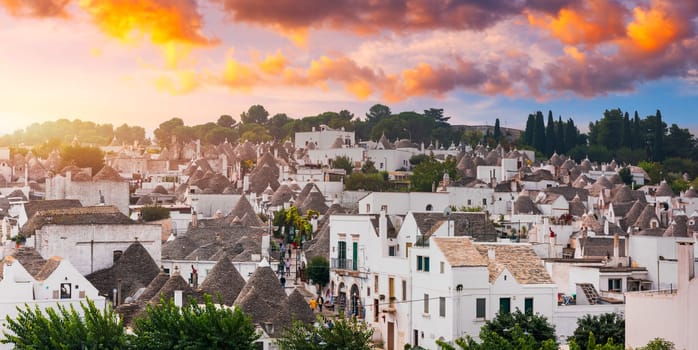 The traditional Trulli houses in Alberobello city, Apulia, Italy. Cityscape over the traditional roofs of the Trulli, original and old houses of this region, Apulia, Alberobello, Puglia, Italy. 