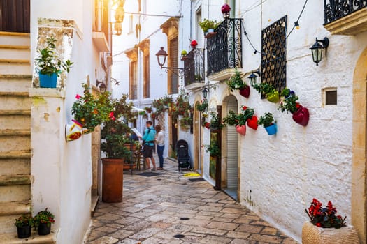 Scenic sight in Locorotondo, Bari Province, Apulia (Puglia), Italy. Characteristic streets in the Locorotondo in Puglia, Italy. Locorotondo is a town of the Metropolitan City of Bari, Apulia, Italy.