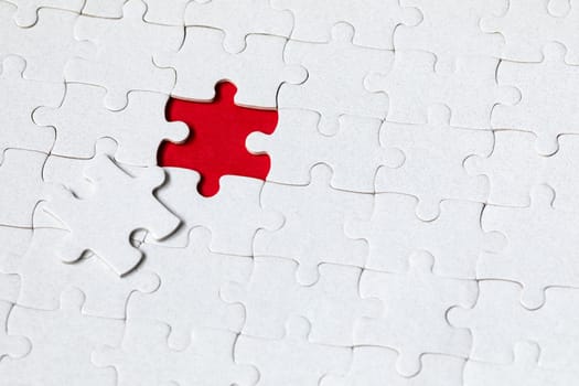Jigsaw puzzle with missing piece. Missing puzzle pieces. Concept image of unfinished task. Completing final task, missing jigsaw puzzle pieces and business concept with a puzzle piece missing.