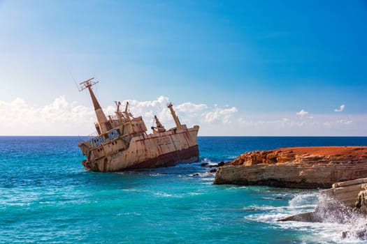 Abandoned Edro III Shipwreck at seashore of Peyia, near Paphos, Cyprus. Historic Edro III Shipwreck site on the shore of the water in Cyprus. Aerial view of Shipwreck EDRO III, Pegeia, Paphos.