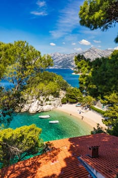 Amazing aerial view of the beautiful Podrace beach in Brela, Makarska Riviera, Croatia. Aerial view of Podrace beach and waterfront on Makarska riviera, Brela, Dalmatia region of Croatia.