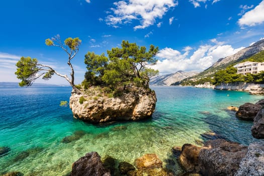 Kamen Brela symbol of the city of Brela on Adriatic coast of Dalmatia, Croatia. Kamen Brela, tiny famous island in Brela, Makarska Riviera, Dalmatia, Croatia.