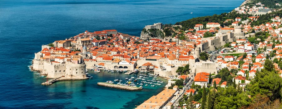 Dubrovnik a city in southern Croatia fronting the Adriatic Sea, Europe. Old city center of famous town Dubrovnik, Croatia. Picturesque view on Dubrovnik old town (medieval Ragusa) and Dalmatian Coast.