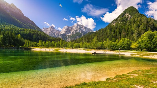 Great nature scenery in Slovenian Alps. Incredible summer landscape on Jasna lake. Triglav national park. Kranjska Gora, Slovenia. Mountain lake Jasna in Krajsnka Gora, Slovenia. 