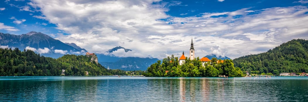 Lake Bled in Slovenia. Beautiful mountains and Bled lake with small Pilgrimage Church. Bled lake and island with Pilgrimage Church of the Assumption of Maria. Bled, Slovenia, Europe.