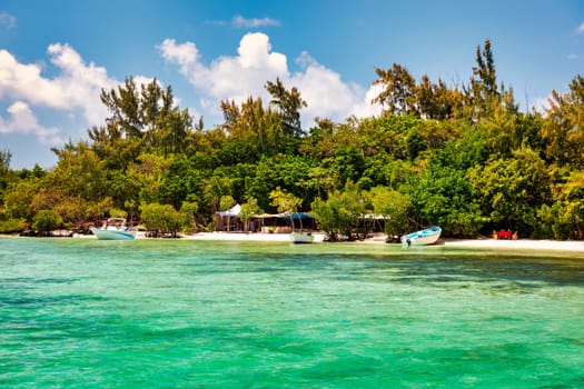 Tropical beach scenery, vacation in paradise island Mauritius. Dream exotic island, tropical paradise. Best beaches of Mauritius island, luxury resorts of Mauritius, Indian Ocean, Africa.