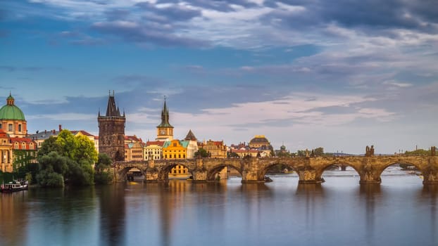Famous iconic image of Charles bridge, Prague, Czech Republic. Concept of world travel, sightseeing and tourism.