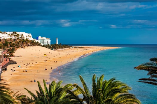 Morro Jable, Fuerteventura, Spain. Breathtaking beach Playa del Matorral in the rays of the sunset. Morro Jable and Playa del Matorral, Fuerteventura, Canary Islands, Spain, Atlantic, Europe