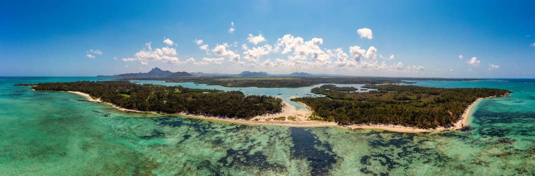 Ile aux Cerfs island with idyllic beach scene, aquamarine sea and soft sand, Ile aux Cerfs, Mauritius, Indian Ocean, Africa. Ile aux Cerf in Mauritius, beautiful water and breathtaking landscape.