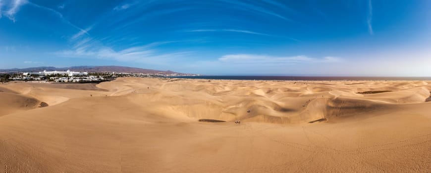 Landscape with Maspalomas town and golden sand dunes, Gran Canaria, Canary Islands, Spain. Natural Reserve of Dunes of Maspalomas, in Gran Canaria, Canary Islands, Spain.