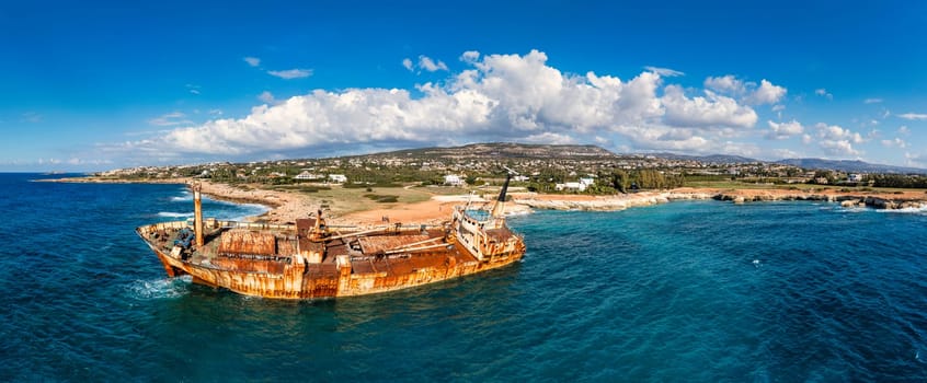 Abandoned Edro III Shipwreck at seashore of Peyia, near Paphos, Cyprus. Historic Edro III Shipwreck site on the shore of the water in Cyprus. Aerial view of Shipwreck EDRO III, Pegeia, Paphos.