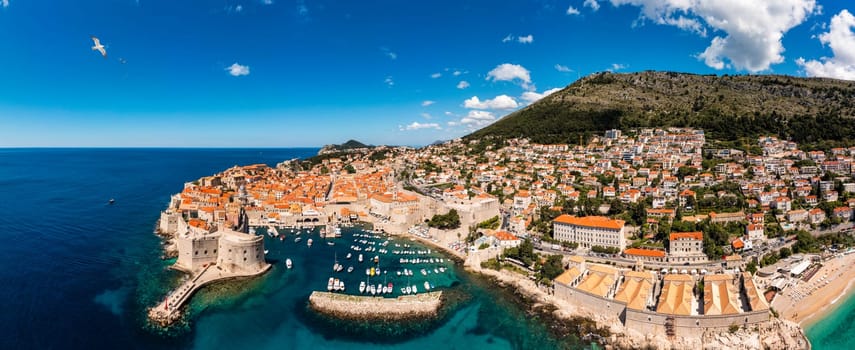 Dubrovnik a city in southern Croatia fronting the Adriatic Sea, Europe. Old city center of famous town Dubrovnik, Croatia. Picturesque view on Dubrovnik old town (medieval Ragusa) and Dalmatian Coast.