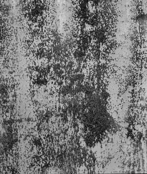 Black and white grunge rust metal texture. Monochrome backdrop of rusty surface dark gray hues. Close-up abstract background of aged old iron, scratch pattern, worn, distress area, corrosion details