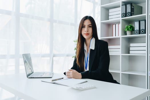 Business, finance and employment, female successful entrepreneurs concept. Confident smiling asian businesswoman, using laptop at work