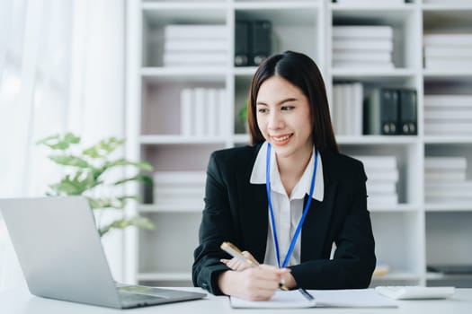 Business, finance and employment, female successful entrepreneurs concept. Confident smiling asian businesswoman, using laptop at work