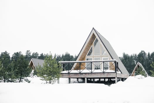 A country house in nature in winter. Rest in an ecologically clean place in winter. Glamping in nature