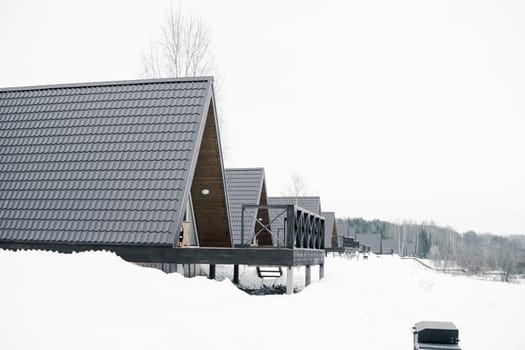 A country house in nature in winter. Rest in an ecologically clean place in winter. Glamping in nature