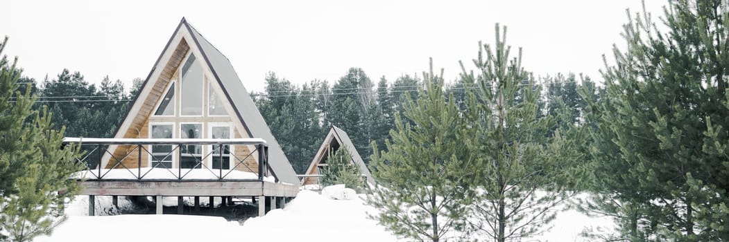 A country house in nature in winter. Rest in an ecologically clean place in winter. Glamping in nature