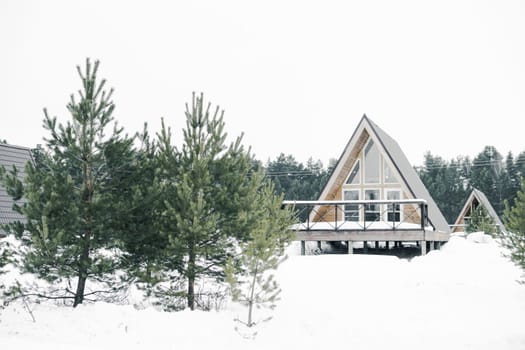 A country house in nature in winter. Rest in an ecologically clean place in winter. Glamping in nature