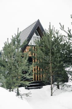 A country house in nature in winter. Rest in an ecologically clean place in winter. Glamping in nature