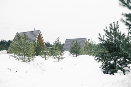 A country house in nature in winter. Rest in an ecologically clean place in winter. Glamping in nature