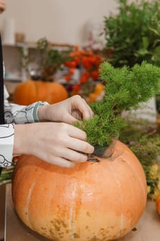 Creating a floral composition in a pumpkin. Making decor with your own hands