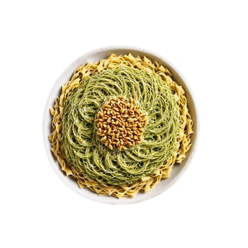 Pesto pasta mandala a vibrant mandala of pesto pasta with Parmesan cheese grating and pine. Food isolated on transparent background.