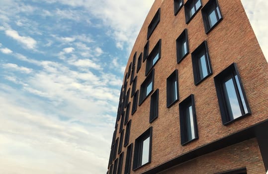 Architecture, real estate, residential apartment building with panoramic windows, modern complex