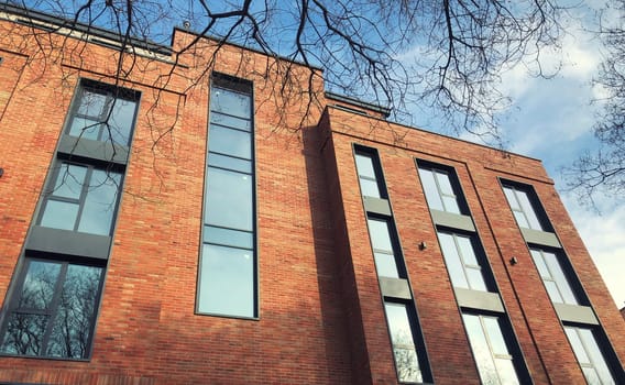 Architecture, real estate, residential apartment building with panoramic windows, modern complex