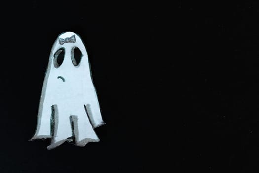 Handmade paper figure for Halloween card decoration. Space for text. Paper craft. Halloween background