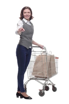 casual mature woman with shopping cart . isolated on a white background.