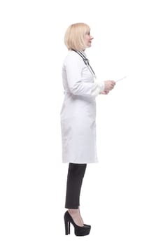 in full growth. qualified female doctor with a digital tablet. isolated on a white background.