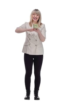 in full growth. very happy woman scattering a bundle of dollar bills. isolated on a white background.