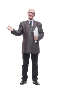 in full growth. business man with a stack of documents. isolated on a white background