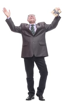 in full growth.business man with a gift box. isolated on a white background.