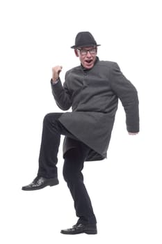 emotional man in a hat and autumn coat . isolated on a white background.