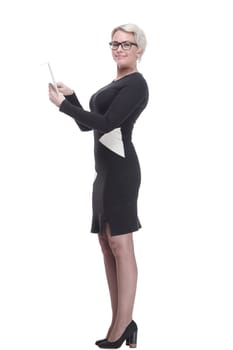 side view. attractive business woman using her digital tablet. isolated on a white background.