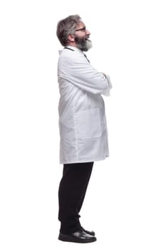 side view. senior male doctor looking at you. isolated on a white background
